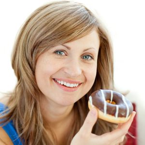Woman Eating Donut